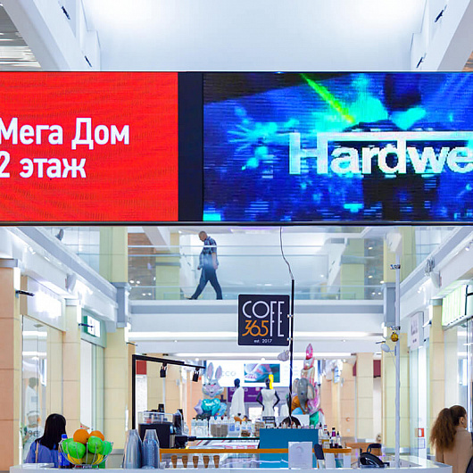 Трансляция видеорекламы на экране ТЦ «Мега Центр»